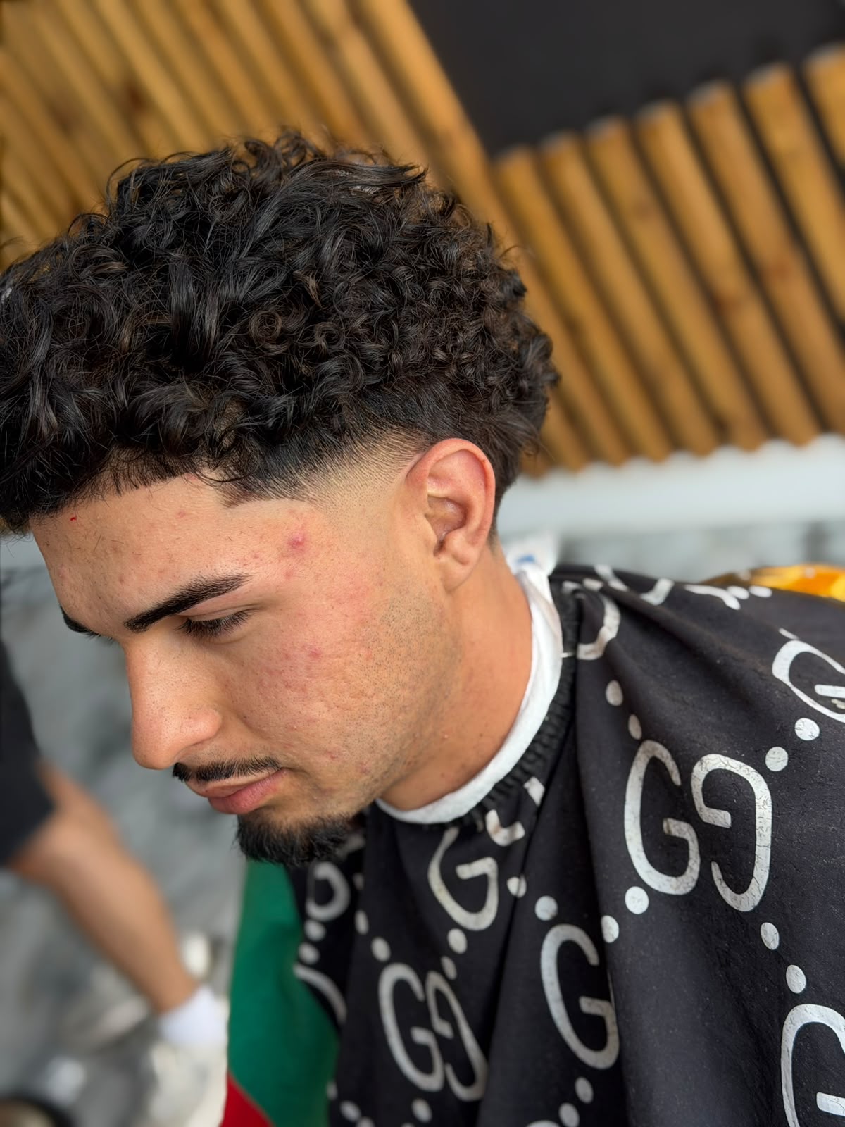 Curly top · lineup at ZK Barber's