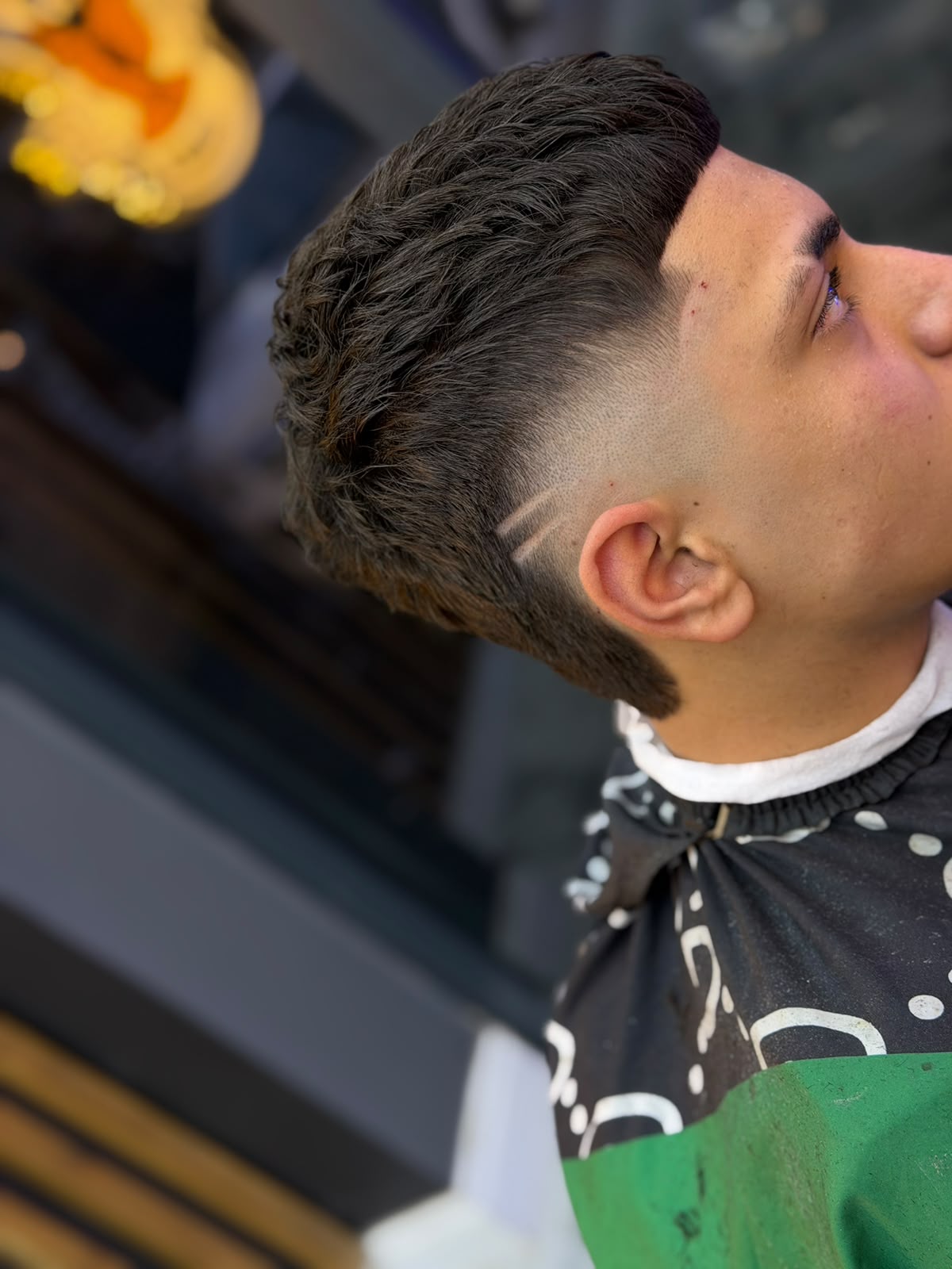 Textured fade · lines at ZK Barber's